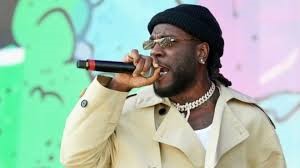 Burna boy acquires new rolls royce dawn